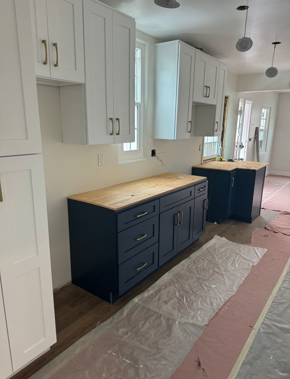 Navy island cabinet installation in progress