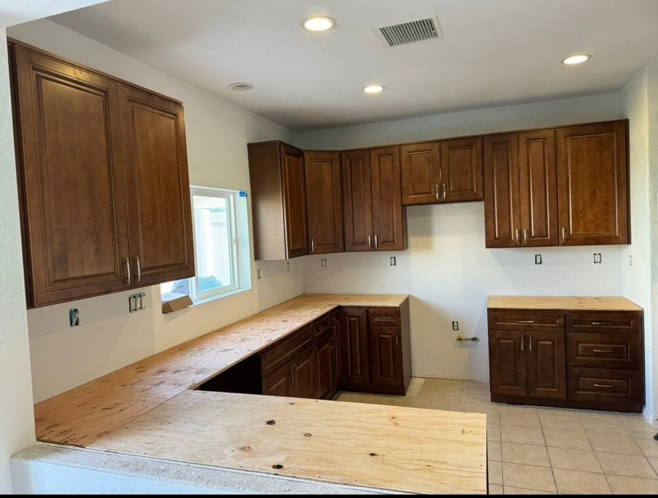 Walnut cabinets with butcher-block countertops