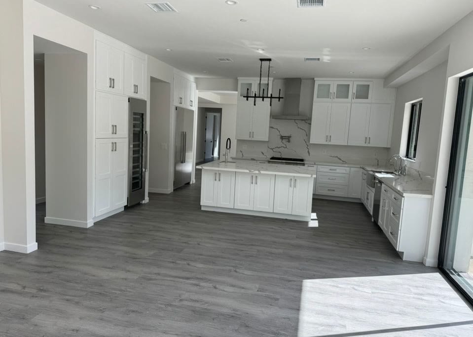 Completed open-concept white kitchen